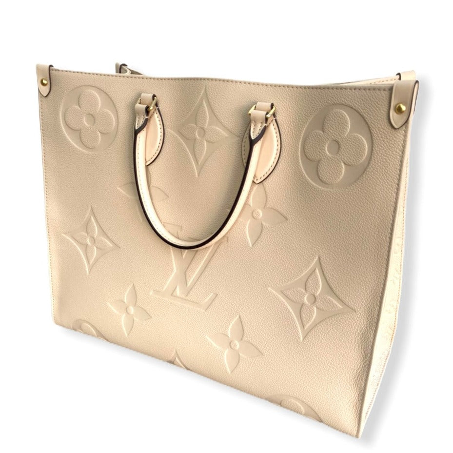 Louis Vuitton Crafty Onthego GM Cream in Embossed Grained Cowhide Leather  with Gold-tone - US