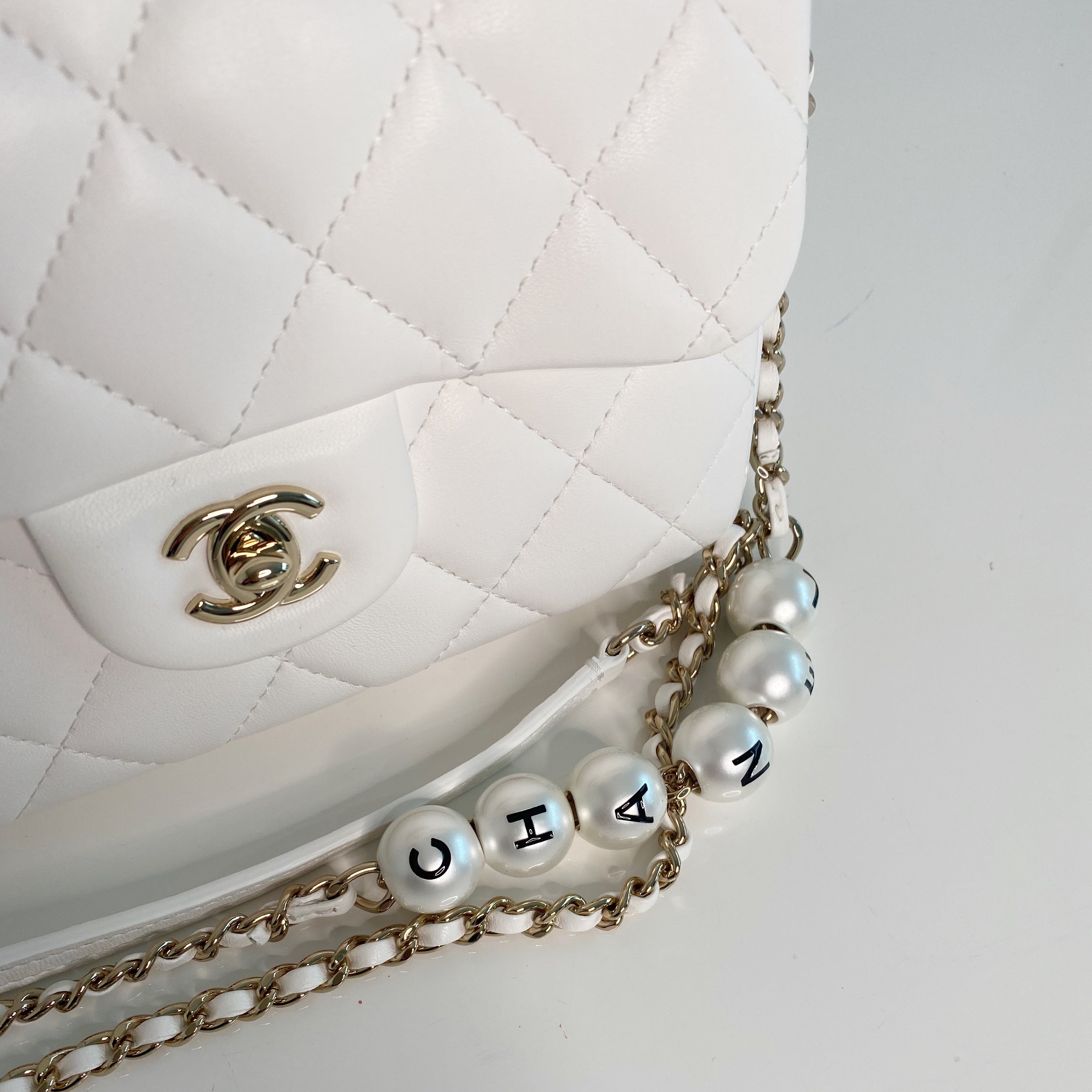 Chanel small pearl logo strap flap bag Clearance