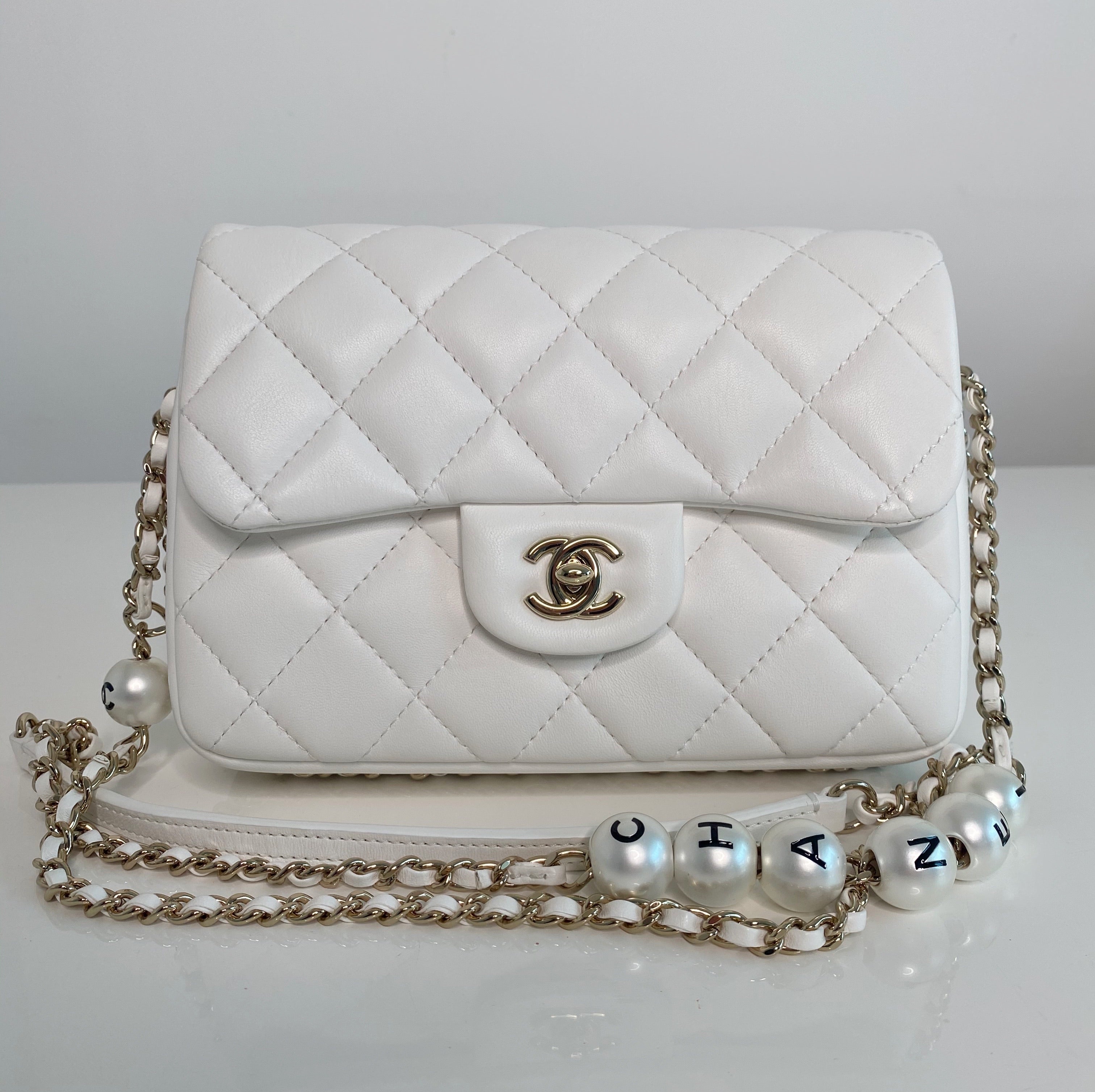 Chanel Pearl Logo Strap Flap Bag White